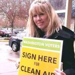 Activists begin collecting signatures for November carbon fee initiative