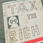 Rally in the rain against the rich