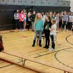 Co-director Caroline Heilborn, foreground, instructs, left to right, Nina Beckwith as 
Mrs. Potts, Maddie McCarthy as Belle, and Kendall Bonham as Madame during a recent rehearsal for Lakeland Hills Elementary Schools upcoming production of Beauty and the Beast. ROBERT WHALE, Auburn Reporter
