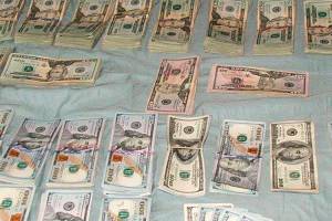 King County Sheriff’s Office seizes $250,000 cash, guns and drugs during tri-county raids