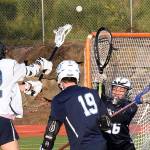 Ravens roll to boys lacrosse victory