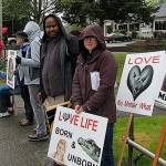 People protest against taxpayer funding for abortion outside of a Kent Planned Parenthood clinic on Saturday. COURTESY PHOTO, St. Stephen the Martyr Catholic Church