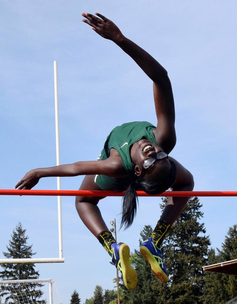 Auburns Rebecca Thareek soars to take the high jump at 5 feet, 4 inches. RACHEL CIAMPI, Auburn Reporter