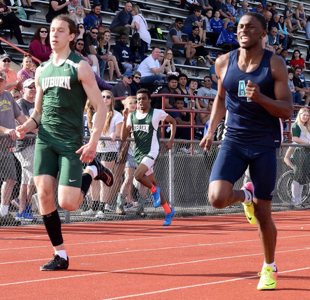 Auburn Riversides Jaden Robinson, right, wins the 400 meters in 50.15 seconds. Zachary Stueck was second in 50.32. RACHEL CIAMPI, Auburn Reporter