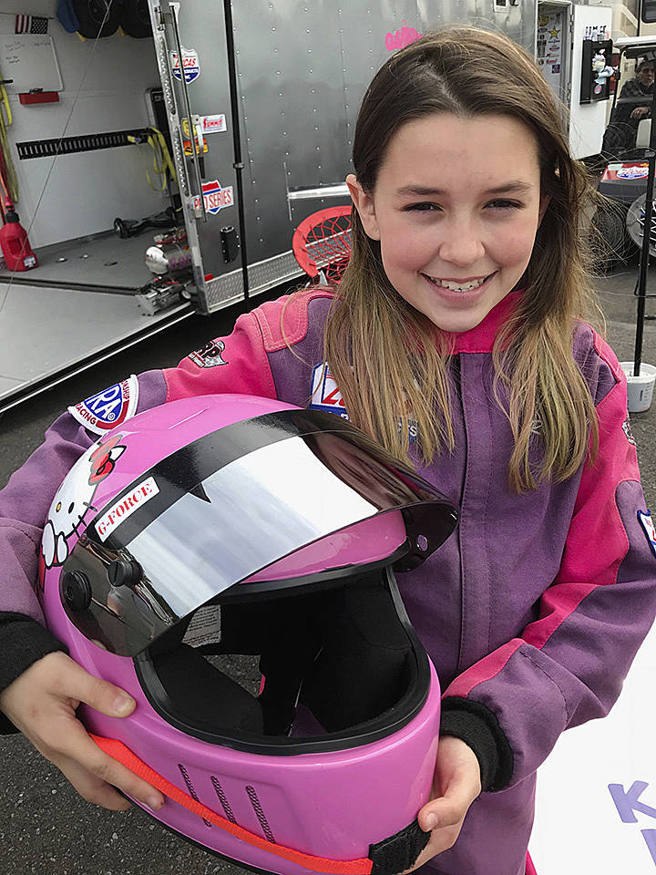 Raylee Higgins, 10, is an up-and-coming driver who proudly wears the pink of the Killer Kitty 8.90 Junior Dragster. MARK KLAAS, Kent Reporter
