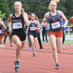 Auburn Mountainviews Lily Lavine, right, takes sixth at 400 meters in a personal-best 59.03 seconds, qualifying for state. RACHEL CIAMPI, Auburn Reporter