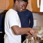 Ezekiel Turner cooks chili in the kitchen. RACHEL CIAMPI, Auburn Reporter