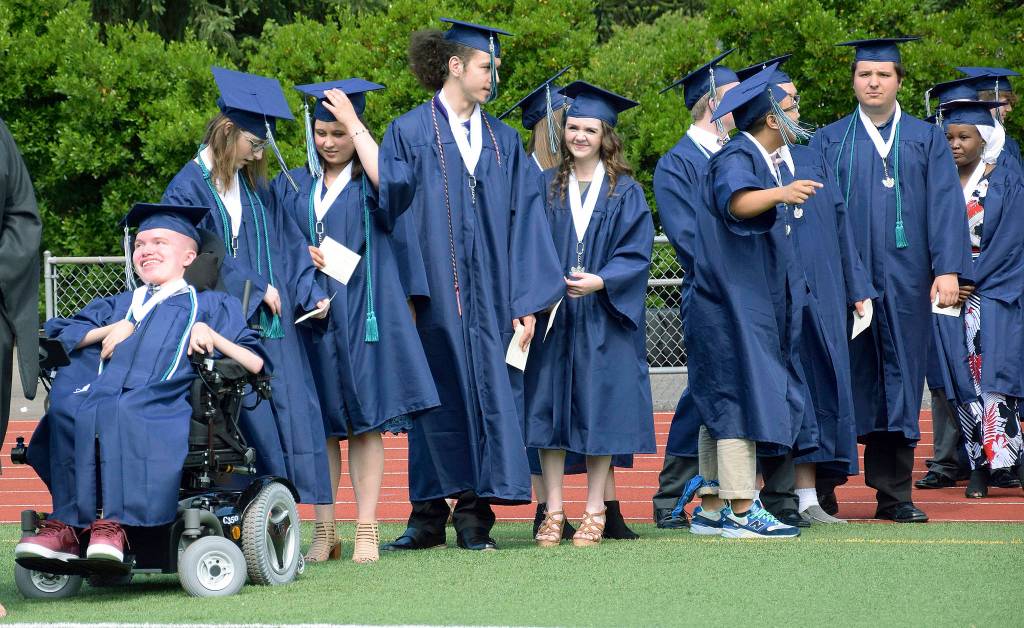 Colby Pretz leads the line of graduates. RACHEL CIAMPI, Auburn Reporter