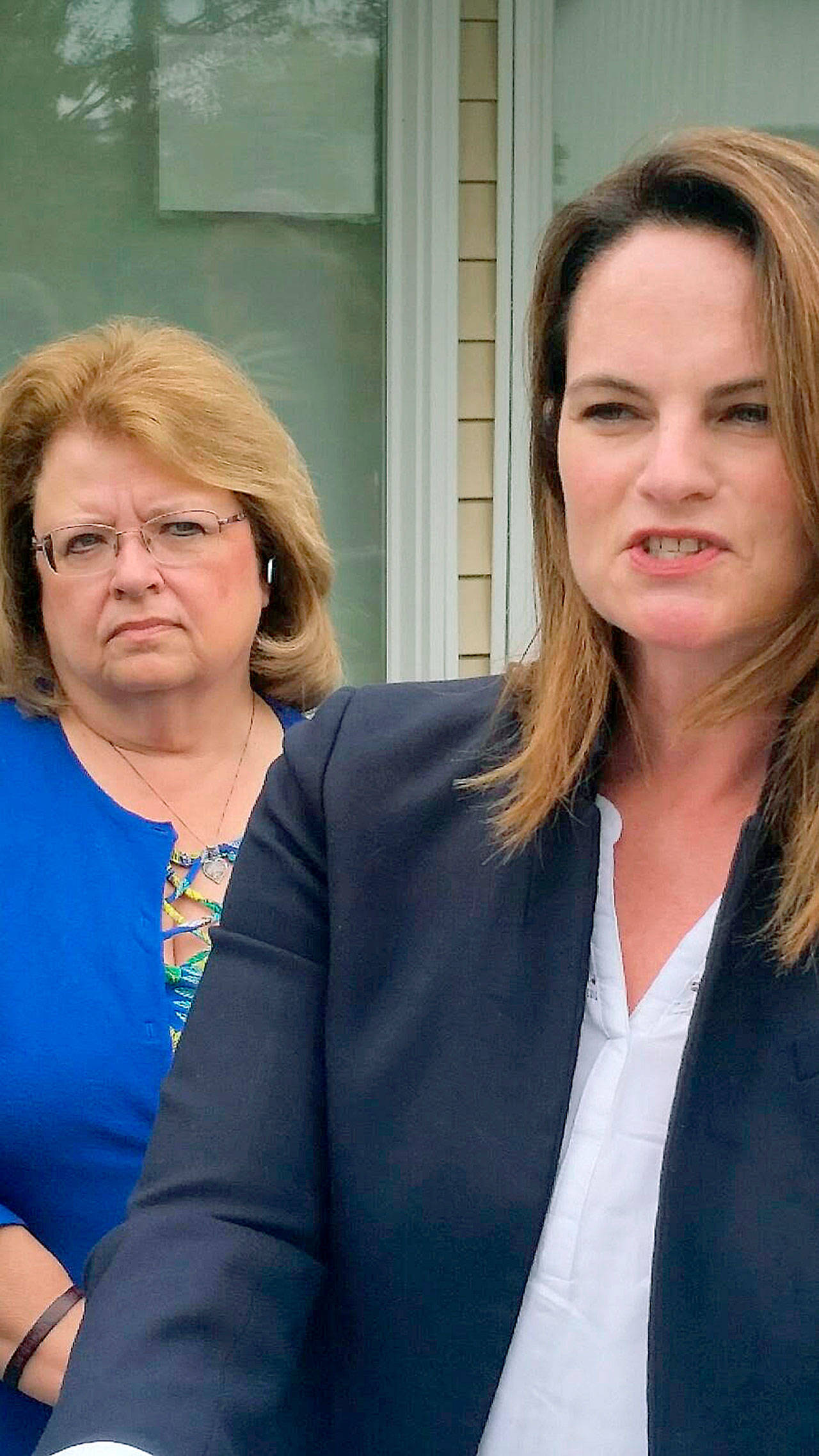 Rosella Mosby of Auburns Mosby Farms, right, speaks at a recent gathering, urging state leaders to support bipartisan legislation that saves the SNAP (food stamp) program and helps feed Washingtons working families. Debbie Christian, executive director of the Auburn Food Bank, listens. ROBERT WHALE, Auburn Reporter