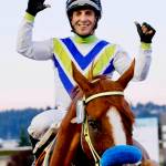 Julien Couton celebrates after riding Blackford to victory – his sixth win of the day – in the ninth race finale Tuesday at Emerald Downs. Couton won despite riding with a broken toe sustained in the final race. COURTESY TRACK PHOTO