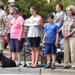 Jeff Monk (grandpa), Yvonne Monk (grandma), Maya Carl (12) holding the sign, Kuhio Carl (10), Dee Giles (great-grandma), Krissie Carl (mom), and their dog Katie watching the procession. RACHEL CIAMPI, Auburn Reporter