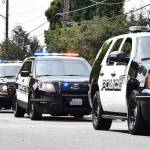 Kent Police help lead the procession through downtown. RACHEL CIAMPI, Auburn Reporter