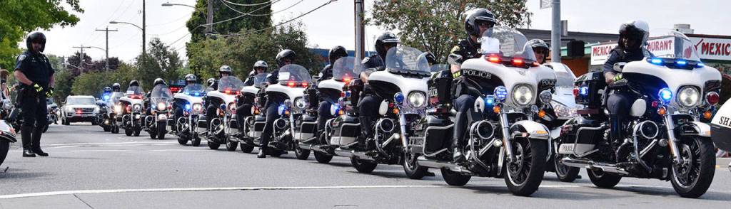 Motorcycle patrol officers participate in the procession. RACHEL CIAMPI, Auburn Reporter