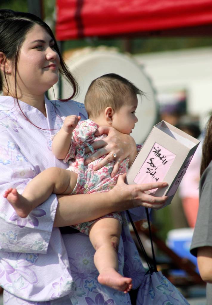 Mother and daughter join the Childrens Lantern Parade, a tradition of the Bon Odori Festival. MARK KLAAS, Auburn Reporter