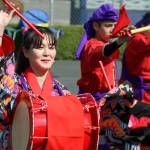 The Okinawa Kenjin-Kai Taiko group performs for the crowd during the Bon Odori Festival at the White River Buddhist Temple last Saturday. Based in Seattle, Okinawa Kenjin-Kai Taiko is a spirited group of adults and children that performs with big and hand-held taiko drums and other instruments. MARK KLAAS, Auburn Reporter