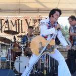Left, Janet Dias, 8, sails down an inflatable slide during Algona Family Fun Days in Machett Park last Saturday. Above, Danny Vernon as Elvis and The Davilles perform a tribute to the music legend on stage.