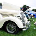 Kolby Benson, 4, and his friend Ashley Lewis take in the classic makes at the car show. RACHEL CIAMPI, Auburn Reporter
