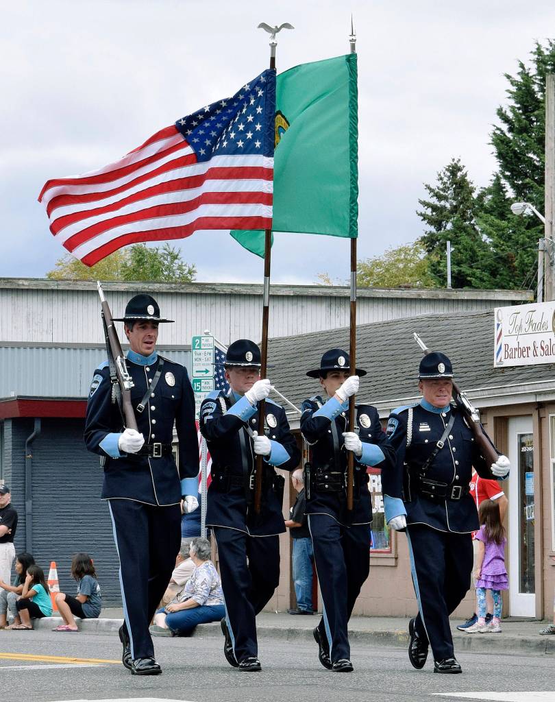 Auburn Police marches in the AuburnFest parade down Main Street last Saturday. RACHEL CIAMPI, Auburn Reporter
