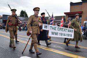 Soldiers dressed in World War I uniforms march down Main Street during last years Veterans Parade in Auburn. The parade featured more than 200 entries and nearly 6,000 parade participants showcasing American strength of will, endurance and purpose. RACHEL CIAMPI, Auburn Reporter