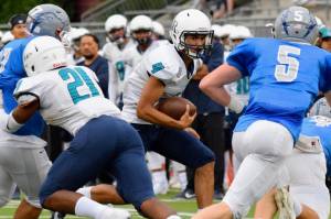 Ravens escape Lions in hard-fought opener, 21-17