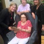 Radine Lozier, director of the Auburn Senior Activity Center, left, and staff members Michelle Young. seated, Connie Humphrey, standing center, and Carrie Stahlecker, right. COURTESY PHOTO