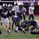 Auburn Riverside Jayden Solis bursts up the middle to score on a 29-yard run in the first quarter against Kentwood on Thursday night. RACHEL CIAMPI, Kent Reporter