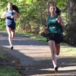 Muckleshoot Tribal Schools Rosalie Fish goes on to take the girls 5,000-meter race. In pursuit, Auburn Riversides Jasmin Muneton was second. RACHEL CIAMPI, Auburn Reporter