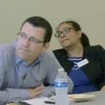 47th Legislative District state Sen. Joe Fain, R-Auburn, and his challenger, Mona Das, D-Covington, listen to other candidates for state office speaking Tuesday, Oct. 16, during a forum at the Auburn Community Event Center. ROBERT WHALE, Auburn Reporter