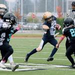 The Panthers Jeremiah Weatherford runs with the ball while avoiding the Spartans. RACHEL CIAMPI, Auburn Reporter