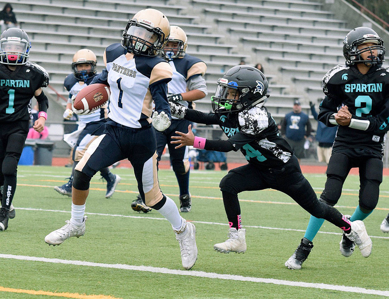 Panthers running back Christian Titialii dashes to score a touchdown against the Spartans. RACHEL CIAMPI, Auburn Reporter