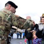 A veteran greets Keenan Stone along Main Street during last years Auburn Veterans Parade. RACHEL CIAMPI, Auburn Reporter