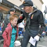 Navy veteran Don Hanson stops to talk to Haakon Aegerter as he walks down Main Street during Auburns Veterans Day Parade in 2013. Hanson died Nov. 3 at age 96. RACHEL CIAMPI, Auburn Reporter