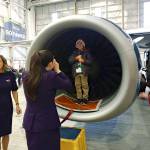 This boy couldnt resist the idle engine of a Delta Air Lines jet at Delta Air Lines and the Seattle YMCAs annual Holiday in the Hangar event, which treated 95 Washington Elementary School second-graders to a makeshift North Pole, Santa Claus and presents Tuesday afternoon at Sea-Tac Airport. COURTESY PHOTO