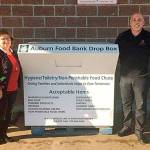 Auburn Safeway Manager Tim May, left, Auburn Food Bank Director Debbie Christian, Spectrum Signs owner Mike Harbin and Matt deKerrie of Ferrell Gas officially welcome back into service the Auburn Food Bankss hygiene and nonperishable food donation box, this time at the Safeway at 101 Auburn Way S., during a Dec. 5 gathering. COURTESY PHOTO, Auburn Food Bank