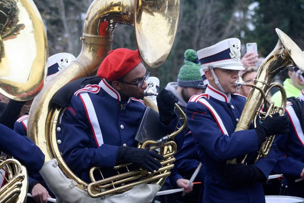 The Kennedy Catholic High School band plays at the grand opening Wednesday in Kent of Dicks Drive-In. STEVE HUNTER, Kent Reporter