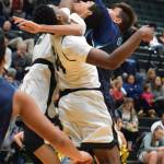 Auburn Riversides Cole Lenihan (33) battles Auburns Isaiah Dunn (14) and Darrell Hester (13) for the rebound during NPSL Olympic action last Friday night. RACHEL CIAMPI, Auburn Reporter