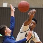 Trojans turn back Ravens in overtime