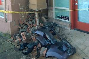 Driver smacks into building
