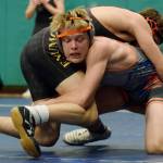 Auburn Mountainviews Brennan Hanson, bottom, takes on Enumclaws Christopher Morgan at 152 pounds Wednesday night. Hanson prevailed. RACHEL CIAMPI, Auburn Riverside