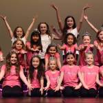 Miss Auburns Little Sisters and Ambassadors perform on stage. RACHEL CIAMPI, Auburn Reporter
