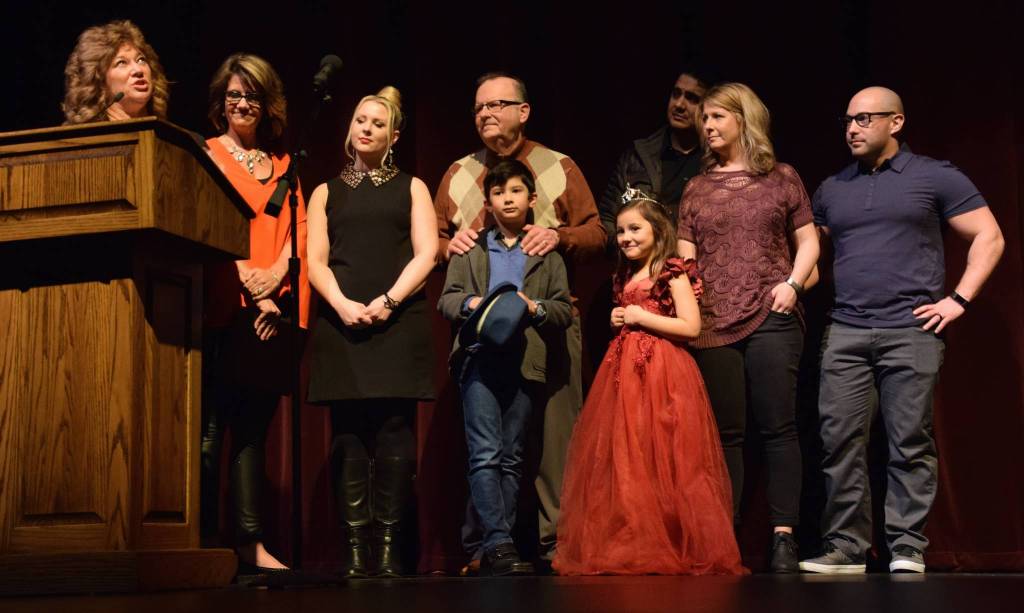 Mayor Nancy Backus, far left, and Tamie Bothell, second from left, join the family of the late Debbie Matejka, who was honored for many years of volunteer work with the Miss Auburn program. RACHEL CIAMPI, Auburn Reporter