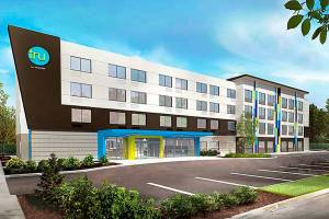 This artists rendering depicts what the Hilton hotel south of Safeway on Auburn Way South will look like. COURTESY IMAGE