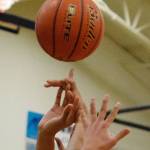 Trojans surge past Ravens, lock up division’s No. 2 spot