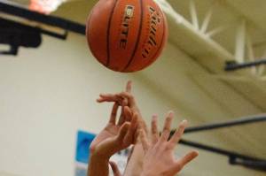 Trojans surge past Ravens, lock up division’s No. 2 spot