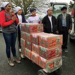 Sikh community fattens Auburn Food bank pantry with generous donation