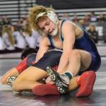 Auburn Riversides Jaden Cassel tries to turn Sunnysides E.J. Villanueva during their 113-pound championship bout at Mat Classic XXXI in the Tacoma Dome on Saturday. Villanueva prevailed, 7-2. RACHEL CIAMPI, Auburn Riverside.