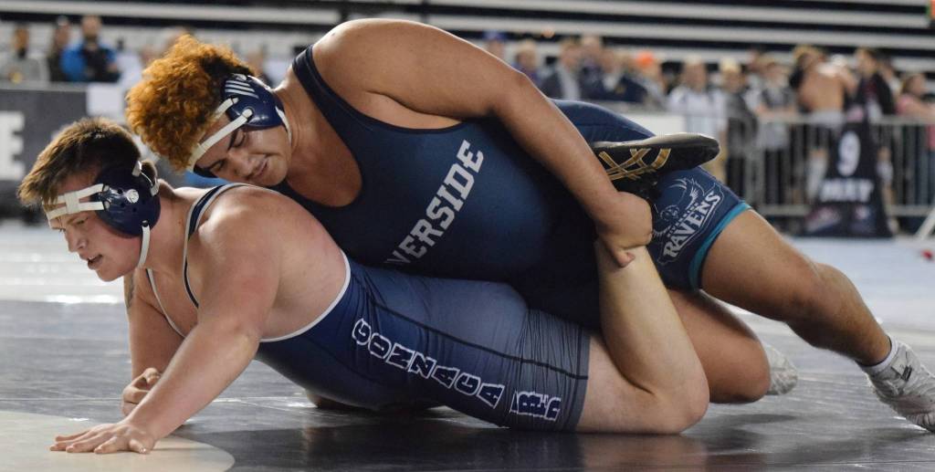 Auburn Riverside heavyweight Eyvar Robles takes on Gonzaga Preps Darius Johnson during their bout for third place at Mat Classic XXXI. Johnson won, 3-1. RACHEL CIAMPI, Auburn Riverside.