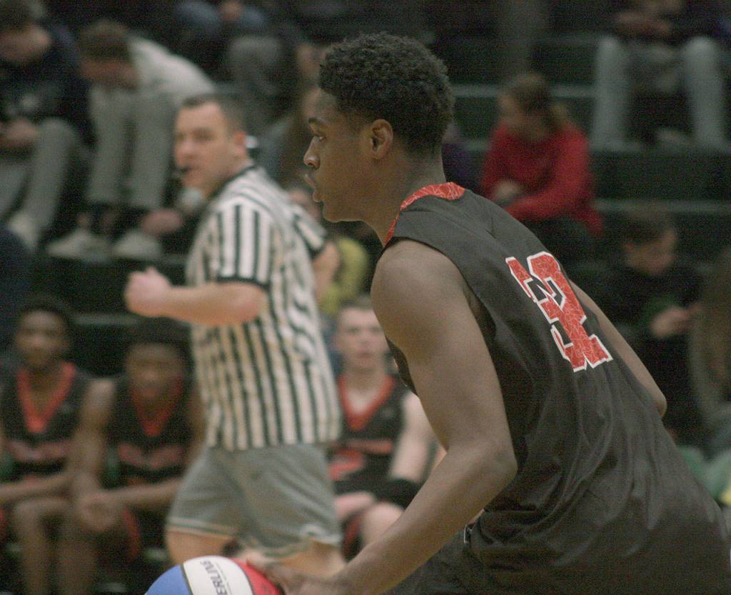 Auburns Isaiah Dunn of the 4A East team darts up the floor during the Sterling Athletics South Sound All-Star Game last Friday night. Dunn scored a game-high 34 points and earned MVP honors for his team. MARK KLAAS, Auburn Reporter