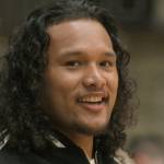 NFL defensive lineman Danny Shelton talks to friends prior to tipoff at the Sterling Athletics South Sound All-Star Game at Auburn High Schools Bob Jones Gymnasium last Friday night. Shelton, an Auburn alumnus, former Husky and a member of the Super Bowl champion New England Patriots, came home to be a celebrity coach for one of the all-star teams. MARK KLAAS, Auburn Reporter