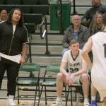 Danny Shelton watches the action from court-side as celebrity coach of the 4A West team during the Sterling Athletics South Sound All-Star Game last Friday night. MARK KLAAS, Auburn Reporter
